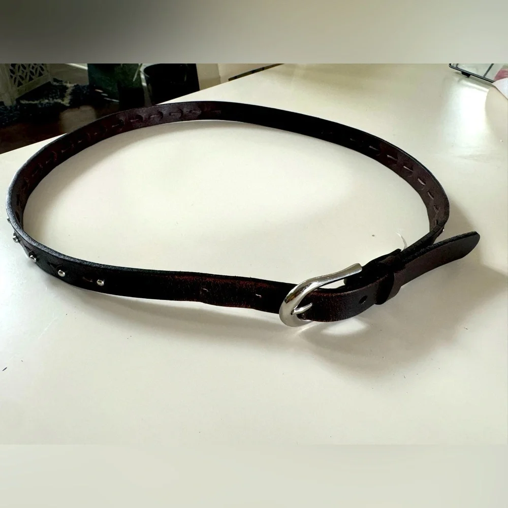 Genuine, leather women’s belt, with silver studs